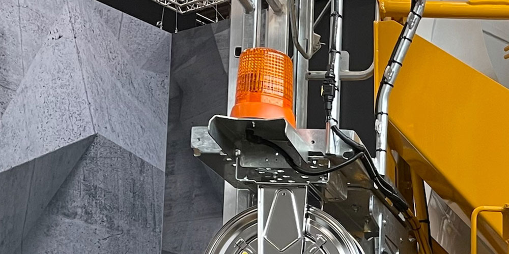 Rotating light orange, in the back